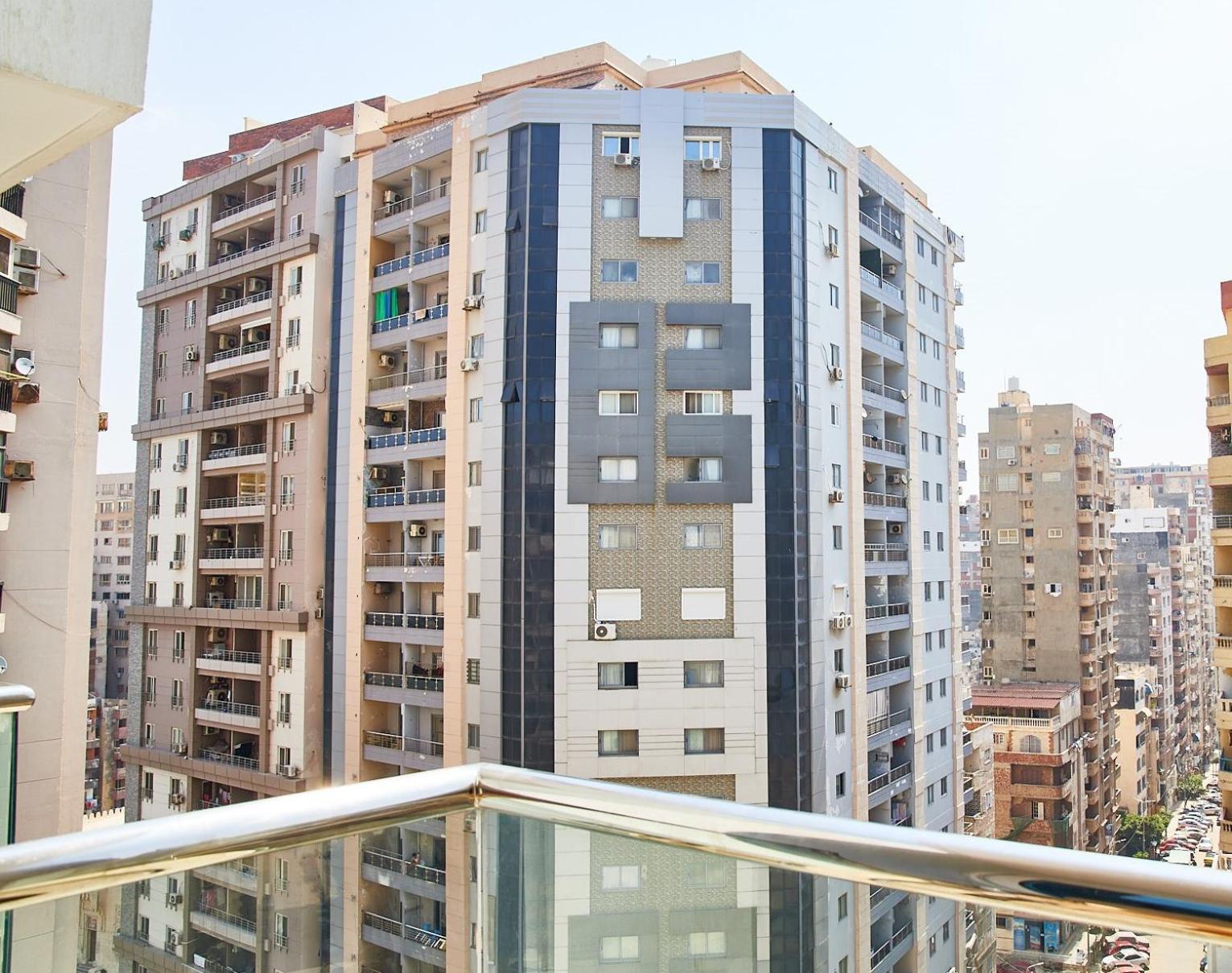 Hilton Alexandria Corniche Hotel Buitenkant foto Residential buildings in Nasr City